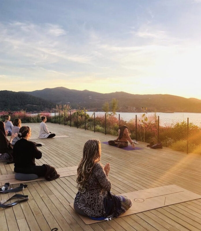 practicing yoga at six senses ibiza